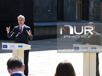 NATO Secretary General Jens Stoltenberg (L) and President of Ukraine Volodymyr Zelensky (R) are participating in a press conference followin...