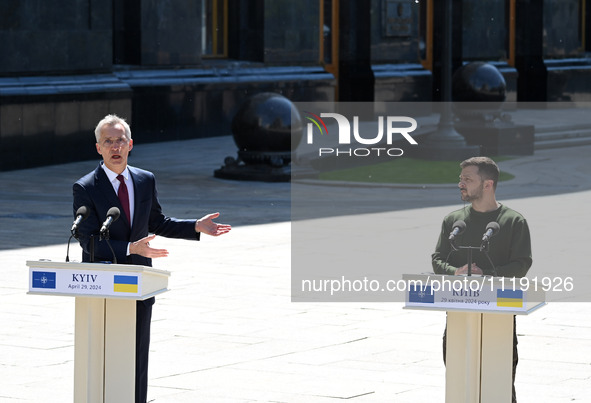 NATO Secretary General Jens Stoltenberg (L) and President of Ukraine Volodymyr Zelensky (R) take part at a press conference following their...