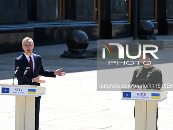 NATO Secretary General Jens Stoltenberg (L) and President of Ukraine Volodymyr Zelensky (R) take part at a press conference following their...