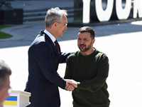 NATO Secretary General Jens Stoltenberg (L) and President of Ukraine Volodymyr Zelensky (R) shake hands after at a press conference followin...