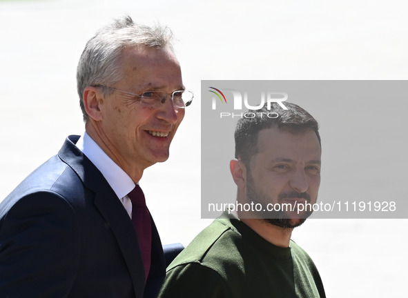 NATO Secretary General Jens Stoltenberg (L) and President of Ukraine Volodymyr Zelensky (R) leave a press conference following their negotia...