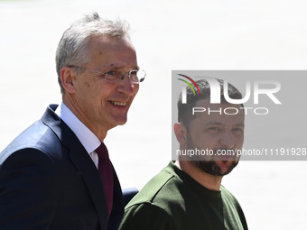 NATO Secretary General Jens Stoltenberg (L) and President of Ukraine Volodymyr Zelensky (R) leave a press conference following their negotia...