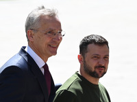 NATO Secretary General Jens Stoltenberg (L) and President of Ukraine Volodymyr Zelensky (R) leave a press conference following their negotia...