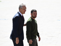 NATO Secretary General Jens Stoltenberg (L) and President of Ukraine Volodymyr Zelensky (R) leave a press conference following their negotia...