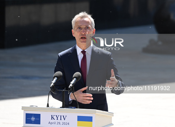 NATO Secretary General Jens Stoltenberg is speaking during a press conference with President of Ukraine Volodymyr Zelensky following their n...