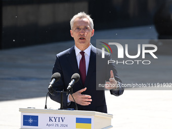 NATO Secretary General Jens Stoltenberg is speaking during a press conference with President of Ukraine Volodymyr Zelensky following their n...