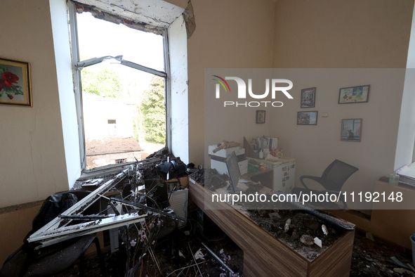 KHARKIV, UKRAINE - APRIL 27, 2024 - Soil and debris carpet the floor of a room at Psychiatric Hospital N3 in the Saltivskyi district followi...