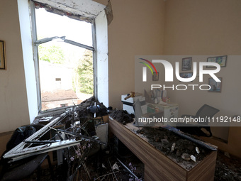 KHARKIV, UKRAINE - APRIL 27, 2024 - Soil and debris carpet the floor of a room at Psychiatric Hospital N3 in the Saltivskyi district followi...