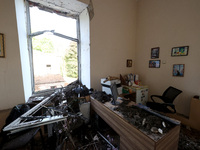 KHARKIV, UKRAINE - APRIL 27, 2024 - Soil and debris carpet the floor of a room at Psychiatric Hospital N3 in the Saltivskyi district followi...