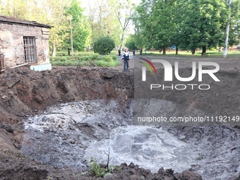 KHARKIV, UKRAINE - APRIL 27, 2024 - A crater is seen at Psychiatric Hospital N3 in the Saltivskyi district following a nighttime Russian S-3...