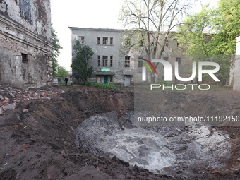 KHARKIV, UKRAINE - APRIL 27, 2024 - A crater is seen at Psychiatric Hospital N3 in the Saltivskyi district following a nighttime Russian S-3...