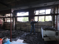 KHARKIV, UKRAINE - APRIL 27, 2024 - A man cleans the premises of Psychiatric Hospital N3 in the Saltivskyi district following a nighttime Ru...