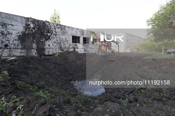 KHARKIV, UKRAINE - APRIL 27, 2024 - A crater is seen at Psychiatric Hospital N3 in the Saltivskyi district following a nighttime Russian S-3...