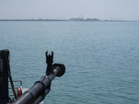 A general view of the Bushehr nuclear power plant is being seen from an Islamic Revolutionary Guard Corps (IRGC) Navy warship during the IRG...