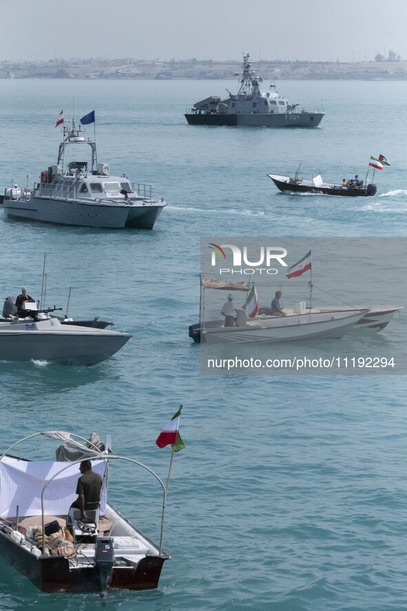 Two Islamic Revolutionary Guard Corps (IRGC) Navy warships and Basij paramilitary force speed boats are participating in the IRGC marine par...