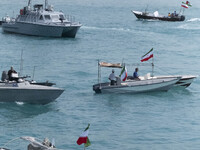 Two Islamic Revolutionary Guard Corps (IRGC) Navy warships and Basij paramilitary force speed boats are participating in the IRGC marine par...