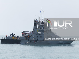 An Islamic Revolutionary Guard Corps (IRGC) Navy warship is sailing along the Persian Gulf during the IRGC marine parade, which is commemora...