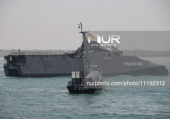 The IRGC Navy Martyr Hassan Bagheri warship is sailing along the Persian Gulf during the IRGC marine parade, which is commemorating the Pers...