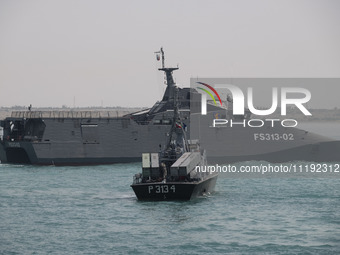 The IRGC Navy Martyr Hassan Bagheri warship is sailing along the Persian Gulf during the IRGC marine parade, which is commemorating the Pers...