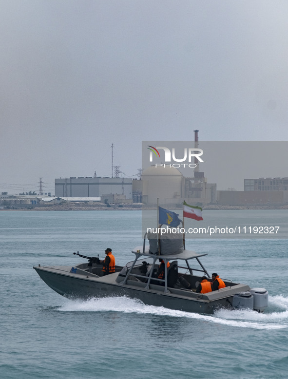 An Islamic Revolutionary Guard Corps (IRGC) speed boat is sailing along the Persian Gulf during the IRGC marine parade, which is commemorati...