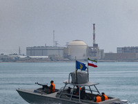 An Islamic Revolutionary Guard Corps (IRGC) speed boat is sailing along the Persian Gulf during the IRGC marine parade, which is commemorati...