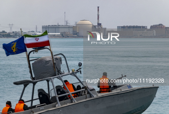 An Islamic Revolutionary Guard Corps (IRGC) speed boat is sailing along the Persian Gulf during the IRGC marine parade, which is commemorati...