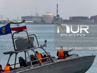 An Islamic Revolutionary Guard Corps (IRGC) speed boat is sailing along the Persian Gulf during the IRGC marine parade, which is commemorati...