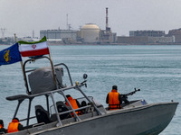 An Islamic Revolutionary Guard Corps (IRGC) speed boat is sailing along the Persian Gulf during the IRGC marine parade, which is commemorati...