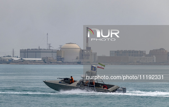 An Islamic Revolutionary Guard Corps (IRGC) speed boat is sailing along the Persian Gulf during the IRGC marine parade to commemorate Persia...