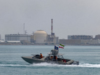 An Islamic Revolutionary Guard Corps (IRGC) speed boat is sailing along the Persian Gulf during the IRGC marine parade to commemorate Persia...