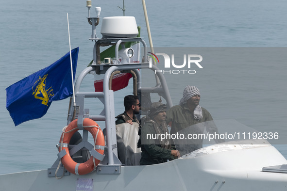 An Islamic Revolutionary Guard Corps (IRGC) speed boat is sailing along the Persian Gulf during the IRGC marine parade, which is commemorati...