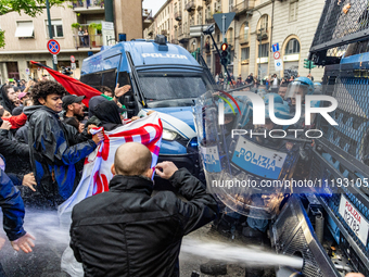 On April 29, 2024, a group of protesters gathered outside the G7 climate meeting in Turin, Italy, repeatedly attempting to reach the meeting...