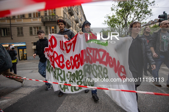 On April 29, 2024, a group of protesters gathered outside the G7 climate meeting in Turin, Italy, repeatedly attempting to reach the meeting...