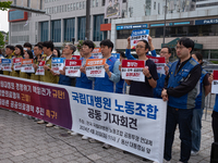 Representatives from the National University Hospitals' Labor Union Joint Struggle Alliance are holding a joint press conference in front of...