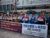 Representatives from the National University Hospitals' Labor Union Joint Struggle Alliance are holding a joint press conference in front of...