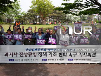 Members of the National Coalition for Victims of State Violence are holding a press conference near the Presidential Office in Yongsan-gu, S...