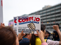 Service union members faced police obstruction outside the U.S. Embassy in Seoul, South Korea, while trying to deliver a statement demanding...