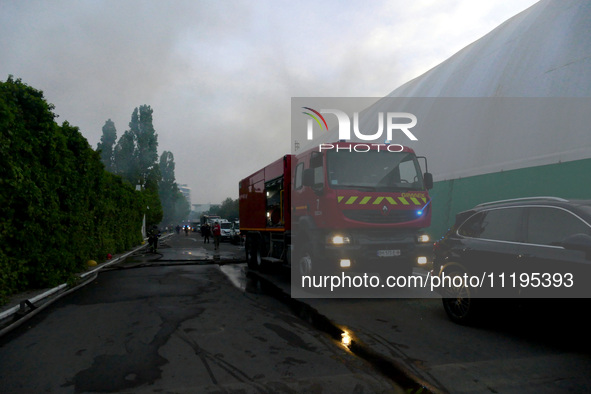 A fire engine is parked outside the Palace of Students of the Odesa Law Academy in Odesa, Ukraine, on April 29, 2024, after the building cau...