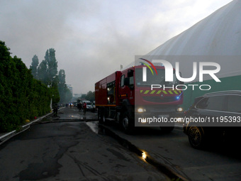 A fire engine is parked outside the Palace of Students of the Odesa Law Academy in Odesa, Ukraine, on April 29, 2024, after the building cau...