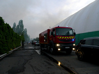 A fire engine is parked outside the Palace of Students of the Odesa Law Academy in Odesa, Ukraine, on April 29, 2024, after the building cau...