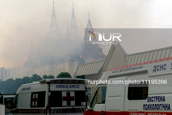 An ambulance is parked outside the Palace of Students of the Odesa Law Academy, which is on fire due to a Russian missile attack in Odesa, U...