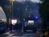 Firefighters are putting out the fire at the Palace of Students of the Odesa Law Academy, which was caused by a Russian missile attack in Od...