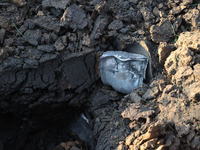 A fragment of a Russian guided bomb is lying on the ground in the Kyivskyi district of Kharkiv, northeastern Ukraine, on April 29, 2024. NO...