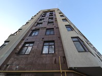 A high-rise building is being damaged by the shockwave from falling Russian guided bombs in Kharkiv, northeastern Ukraine, on April 29, 2024...