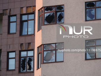 A high-rise building is being damaged by the shockwave from falling Russian guided bombs in Kharkiv, northeastern Ukraine, on April 29, 2024...