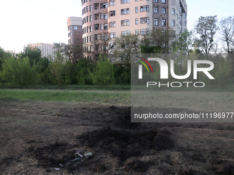 A crater is being seen in the ground after the Russian troops launched guided bombs at Kharkiv, northeastern Ukraine, on April 29, 2024. NO...