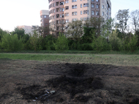 A crater is being seen in the ground after the Russian troops launched guided bombs at Kharkiv, northeastern Ukraine, on April 29, 2024. NO...