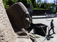 The dismantling of the Soviet monument symbolizing friendship between the Ukrainian and Russian peoples is continuing in central Kyiv, Ukrai...