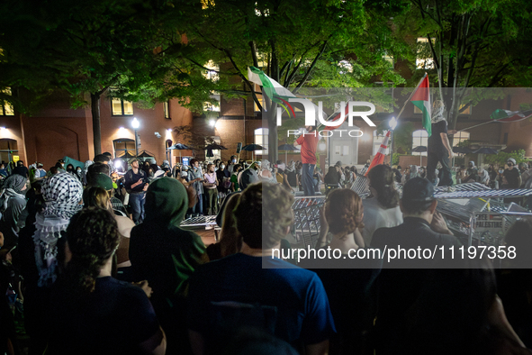 Students rally at a Gaza solidarity encampment at George Washington University, Washington, DC, April, 29, 2024.  GWU students have maintain...