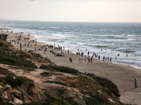 Palestinians are enjoying the beach at the Nuseirat refugee camp in the central Gaza Strip, on April 30, 2024, amid the ongoing conflict in...